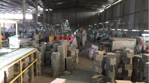 Production of cement tile