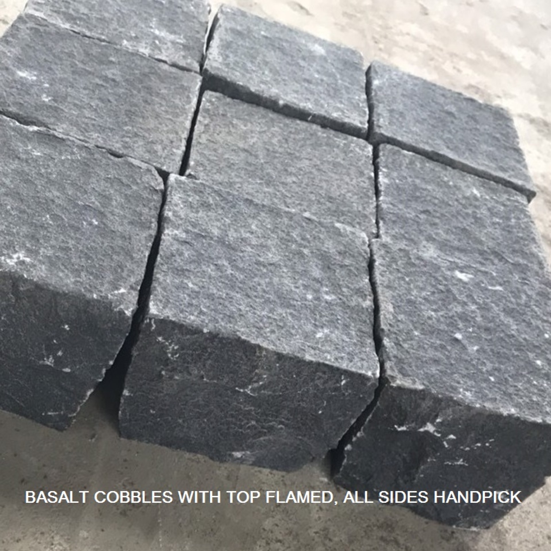 Black basalt cobble top flamed, sides handpick