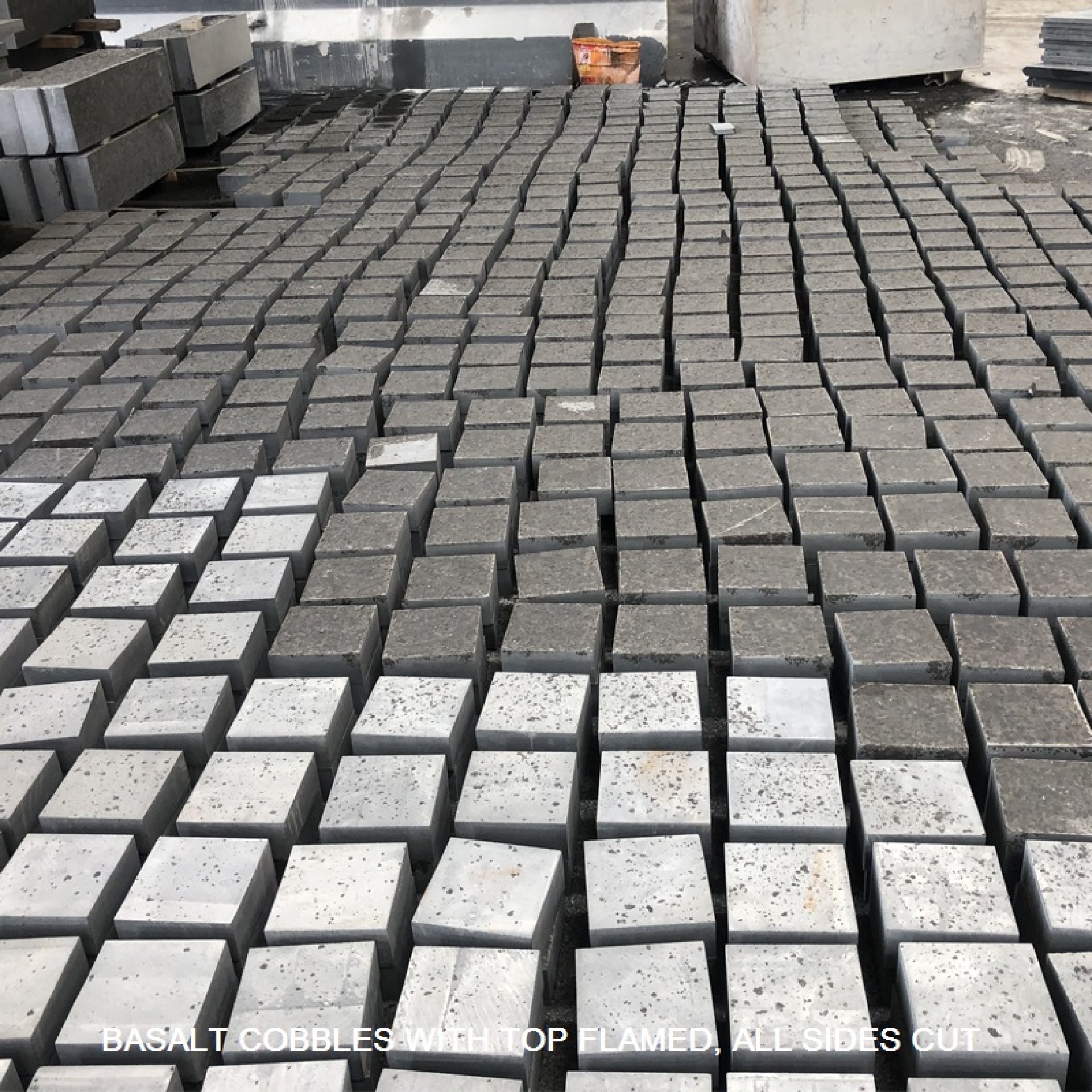 Black basalt cobble top flamed, sides cut