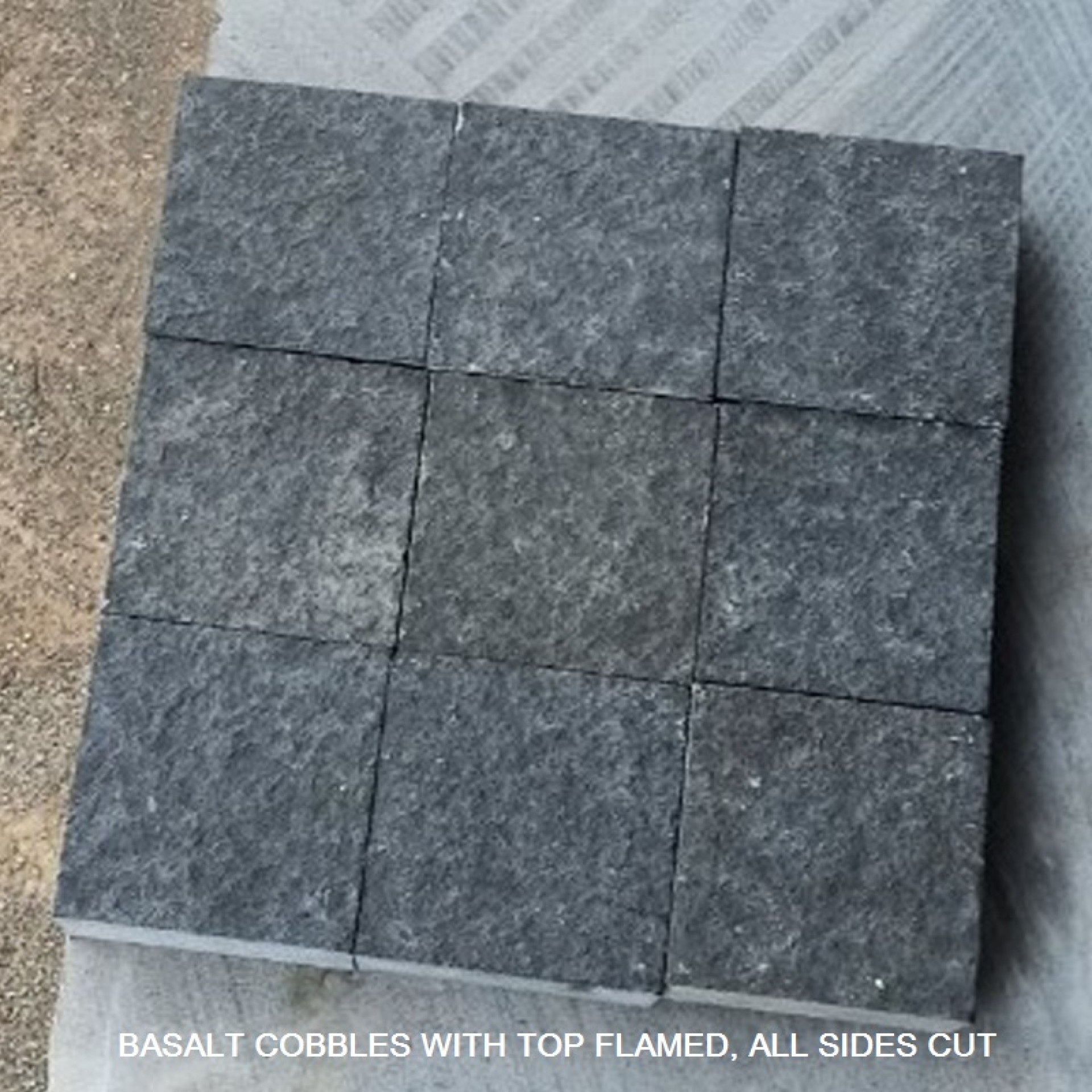 Black basalt cobble top flamed, sides sawn cut