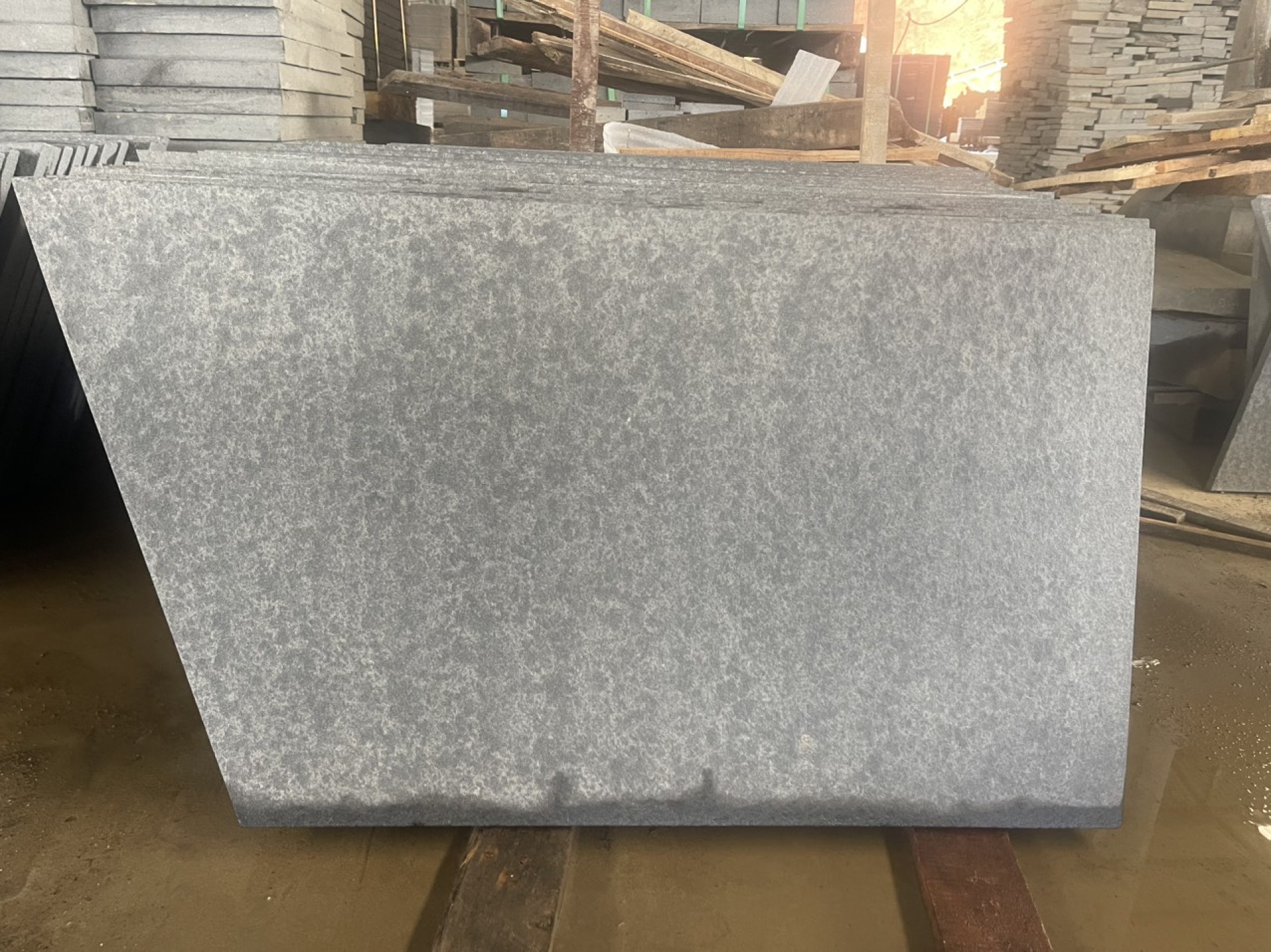 Grey basalt slabs flamed and WJ finish